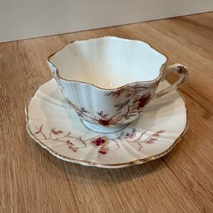 White floral tea cup with pink flowers and gold finishing